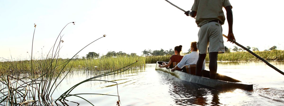 Canoe-Trip-with-traditional-mokoro-boat-on-the-river-through-Okavango-Delta